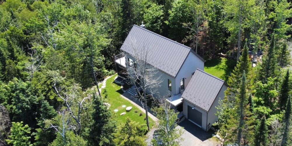 Aerial view, La Maison perchée, Biophile architecture